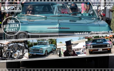Oldtimer-Cabrio f&auml;hrt mit zwei Passagieren auf einem Event