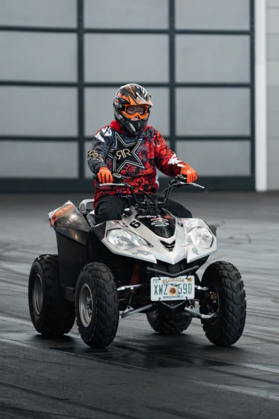 Fahrer auf einem Quad in Motorradjacke bei der Motorradwelt 2026