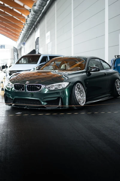 BMW M4 in gr&uuml;n auf der Tuning World Bodensee 2026 in Friedrichshafen