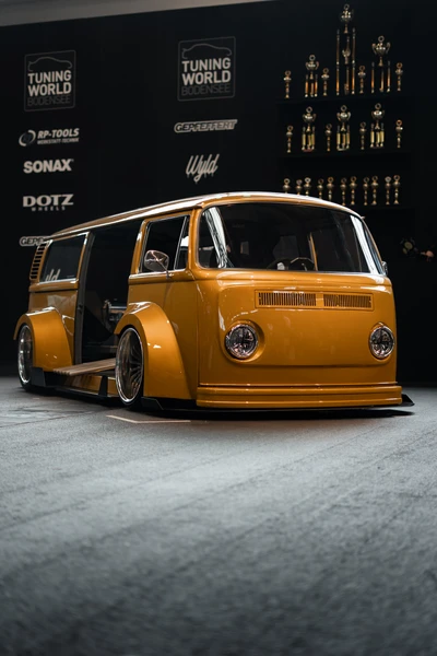Tuning World Bodensee 2026 Gelber umgebauter Kleinbus auf der Tuning World Bodensee 2026, Friedrichshafen