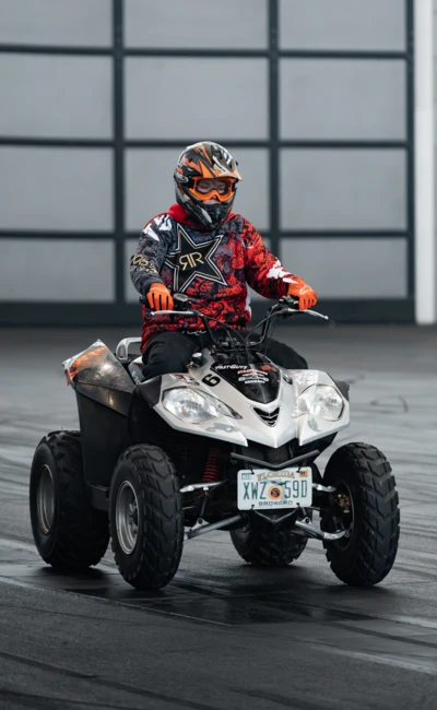 Fahrer auf einem Quad in Motorradjacke bei der Motorradwelt 2026